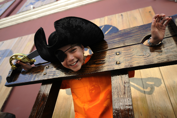Pirates1 a person sitting on a wooden bench