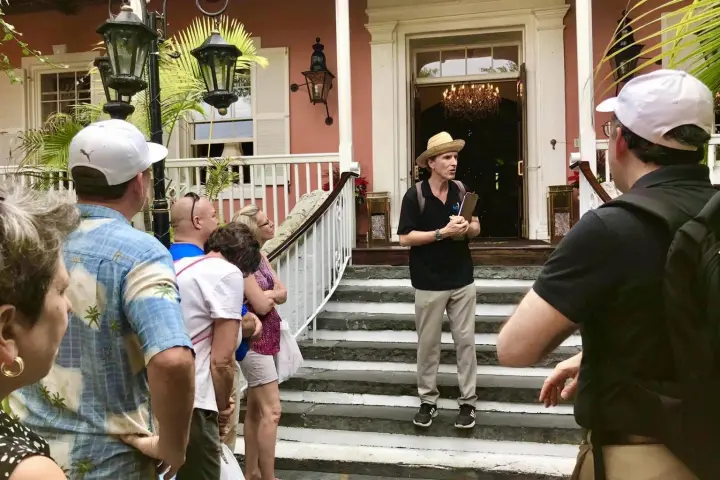 a group of people walking down a street